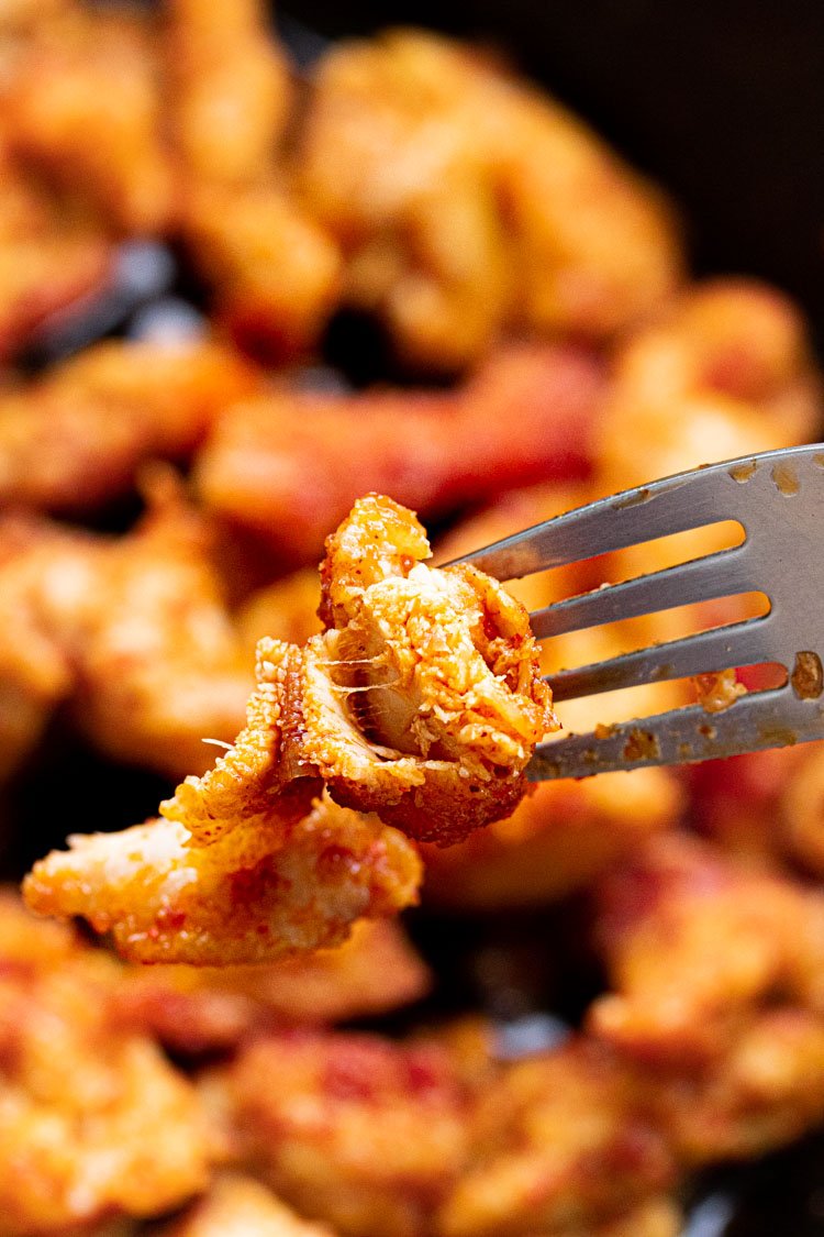 spicy chicken on a fork