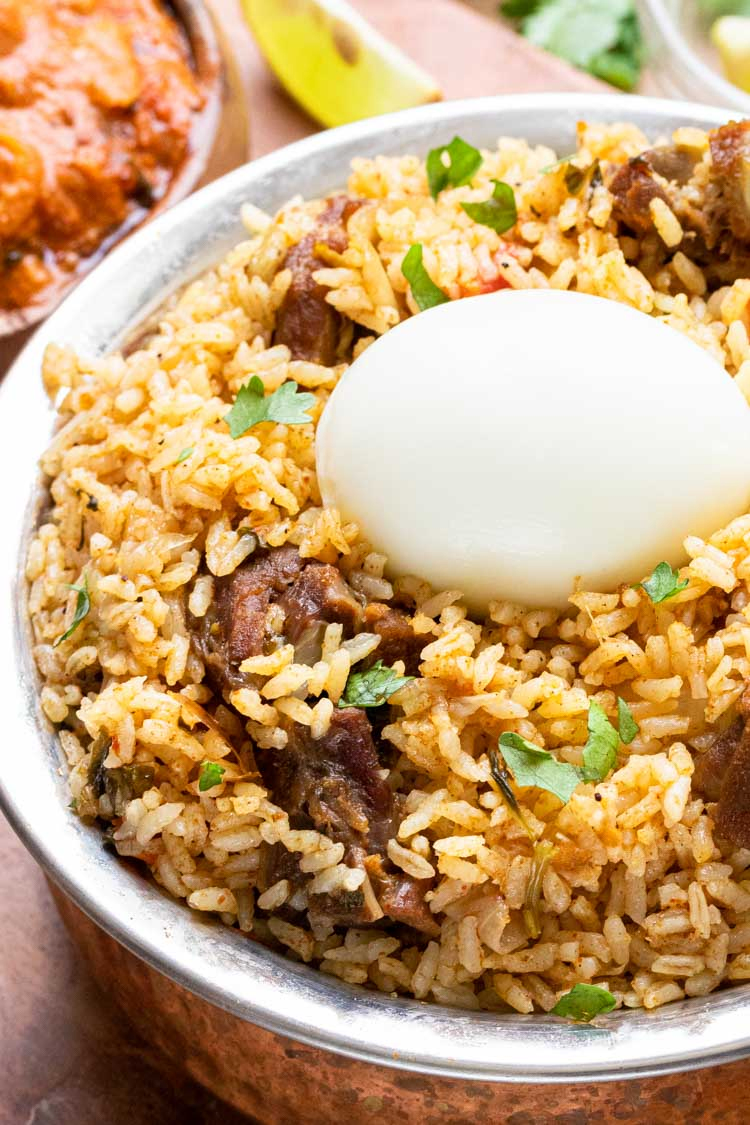 egg on lamb rice south indian style bowl