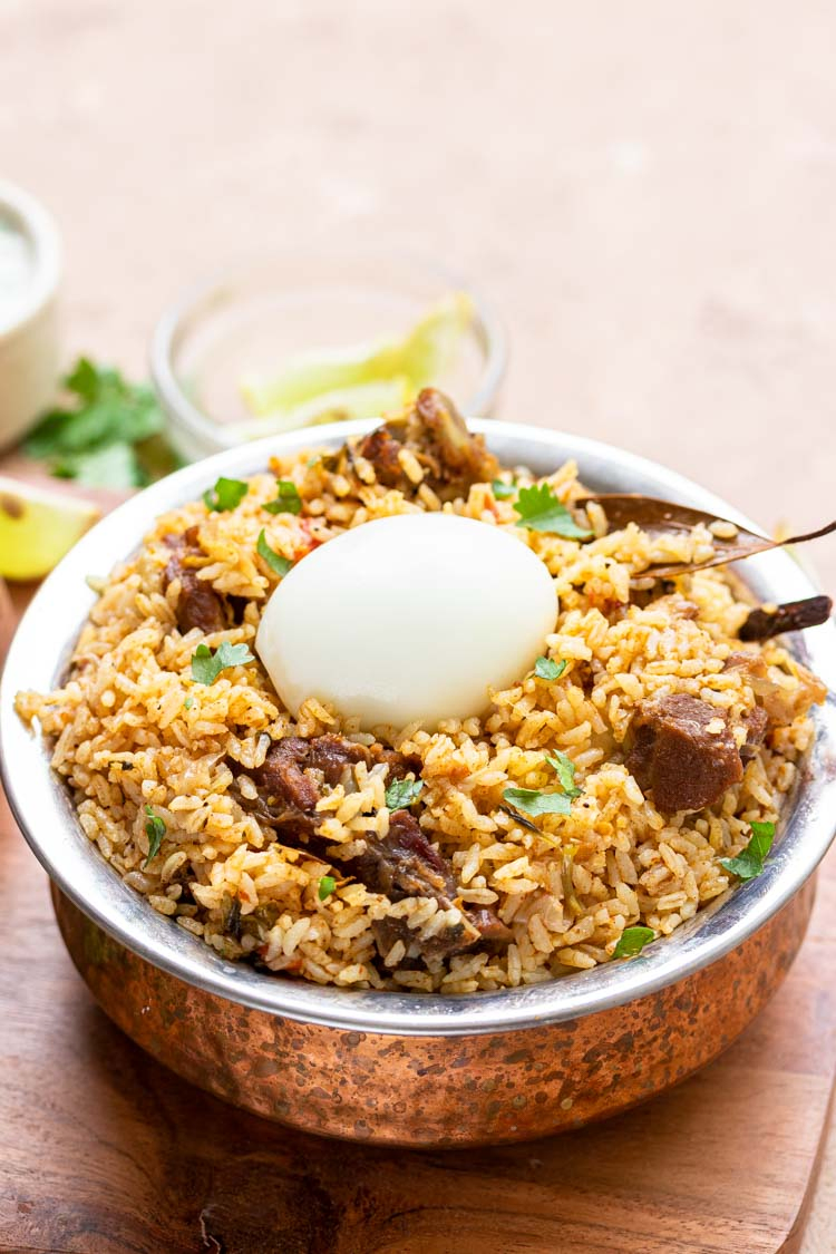lamb rice in a bowl with egg