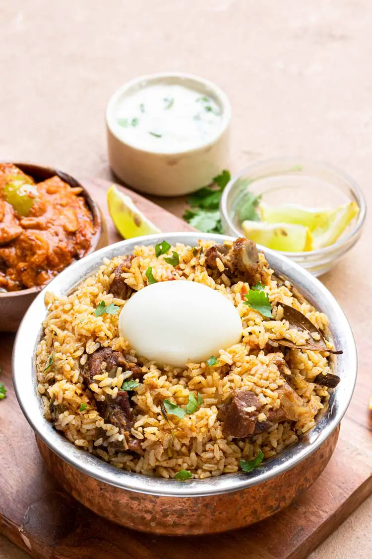 authentic mutton biryani recipe served with dalcha and raita, Instant Pot Mutton Biryani