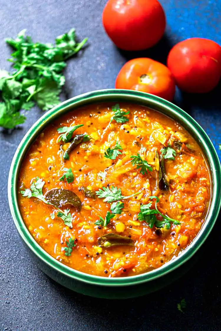Thakkali Bajji served in a green ceramic bowl, Tomato Chutney food photography, Thakkali chutney
