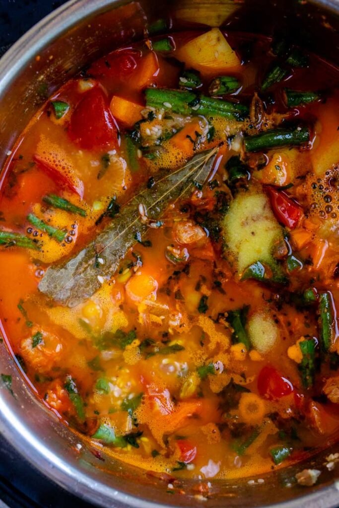 Cooking vegetable Briyani inside an instant pot bowl