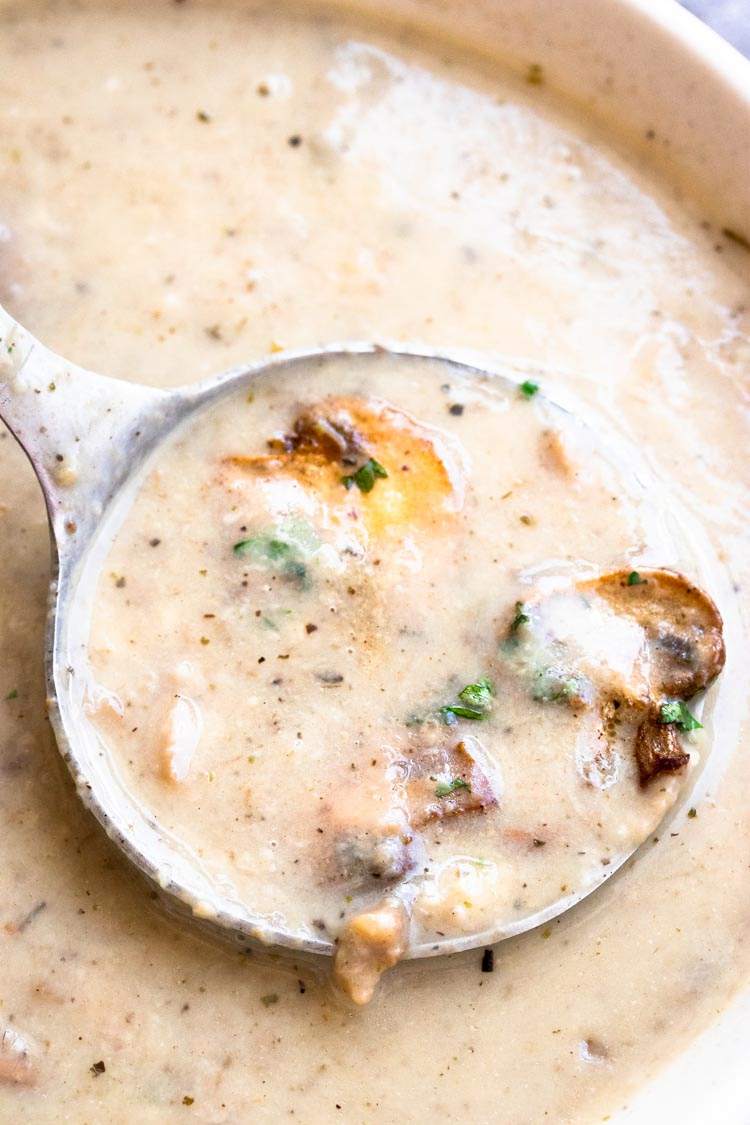 a ladle full of instant pot mushroom soup, easy mushroom soup recipe