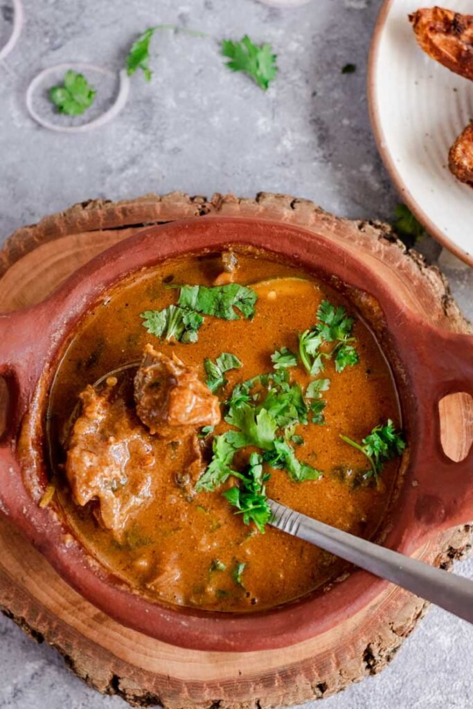 south indian mutton gravy, curry, kulambu, food photography, mutton gravy recipe