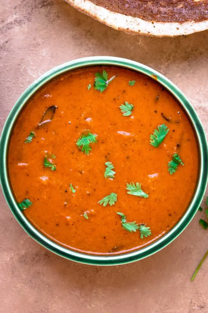 tomato kulambu / south indian thakkali kuzhambu in a bowl