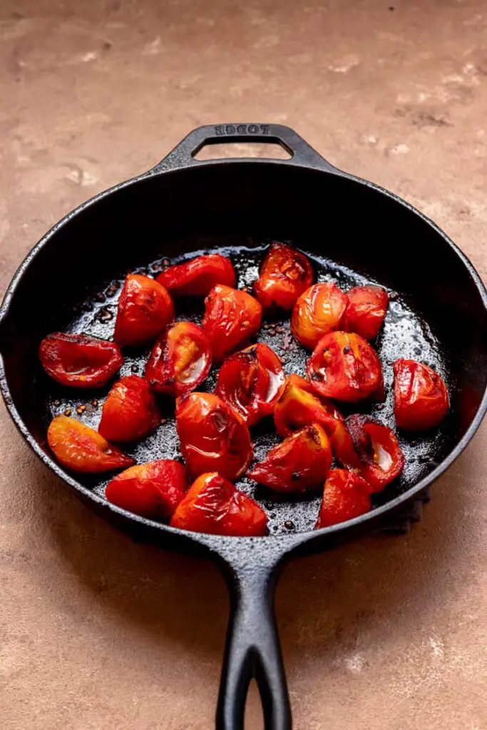 roasted tomatoes in cast iron skillet