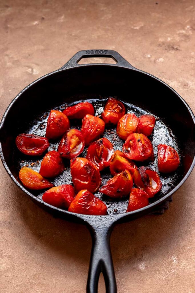 roasted tomatoes in cast iron skillet